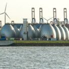 Gas,Storage,Reservoir,,Wind,Turbines,And,Cranes,In,The,Harbour